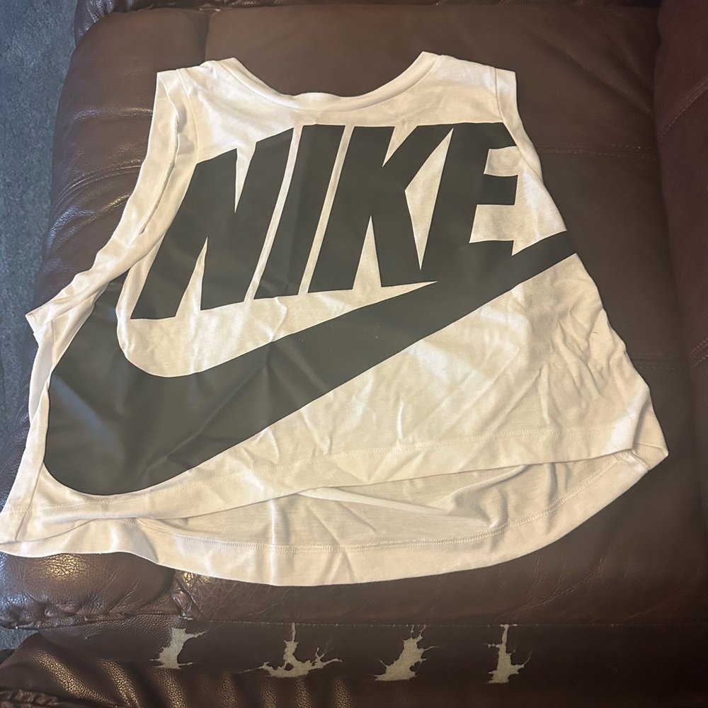 Women’s size large cropped white with black writing Nike athletic top!